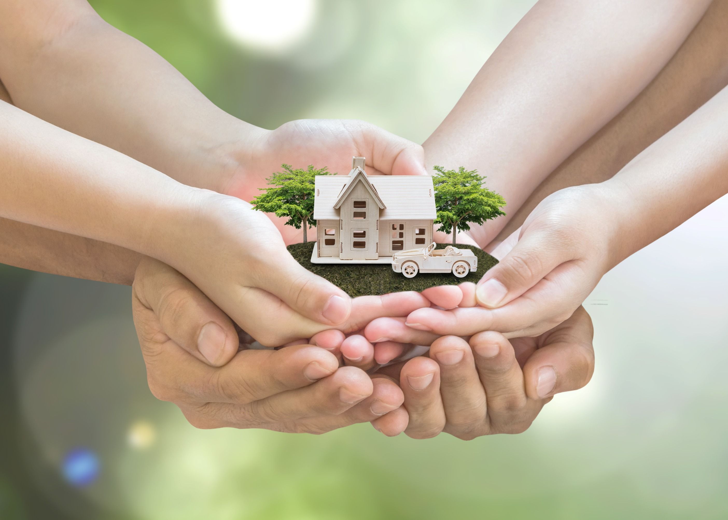 Home_loan,_car_insurance,_family_life_assurance_protection,_financial_mortgage_for_house_building,_and_legacy_planning_investment_concept_with_children_-_parent's_hands_holding_private_property
